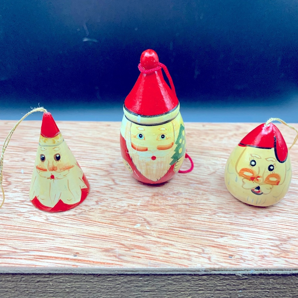 Three wooden Santa Claus with original hangers